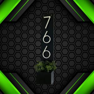 Wall plaque with planter box